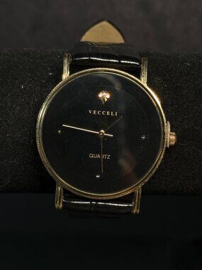 Vecceli Quartz Watch Black Dial Gold Tone Case New Battery Unused